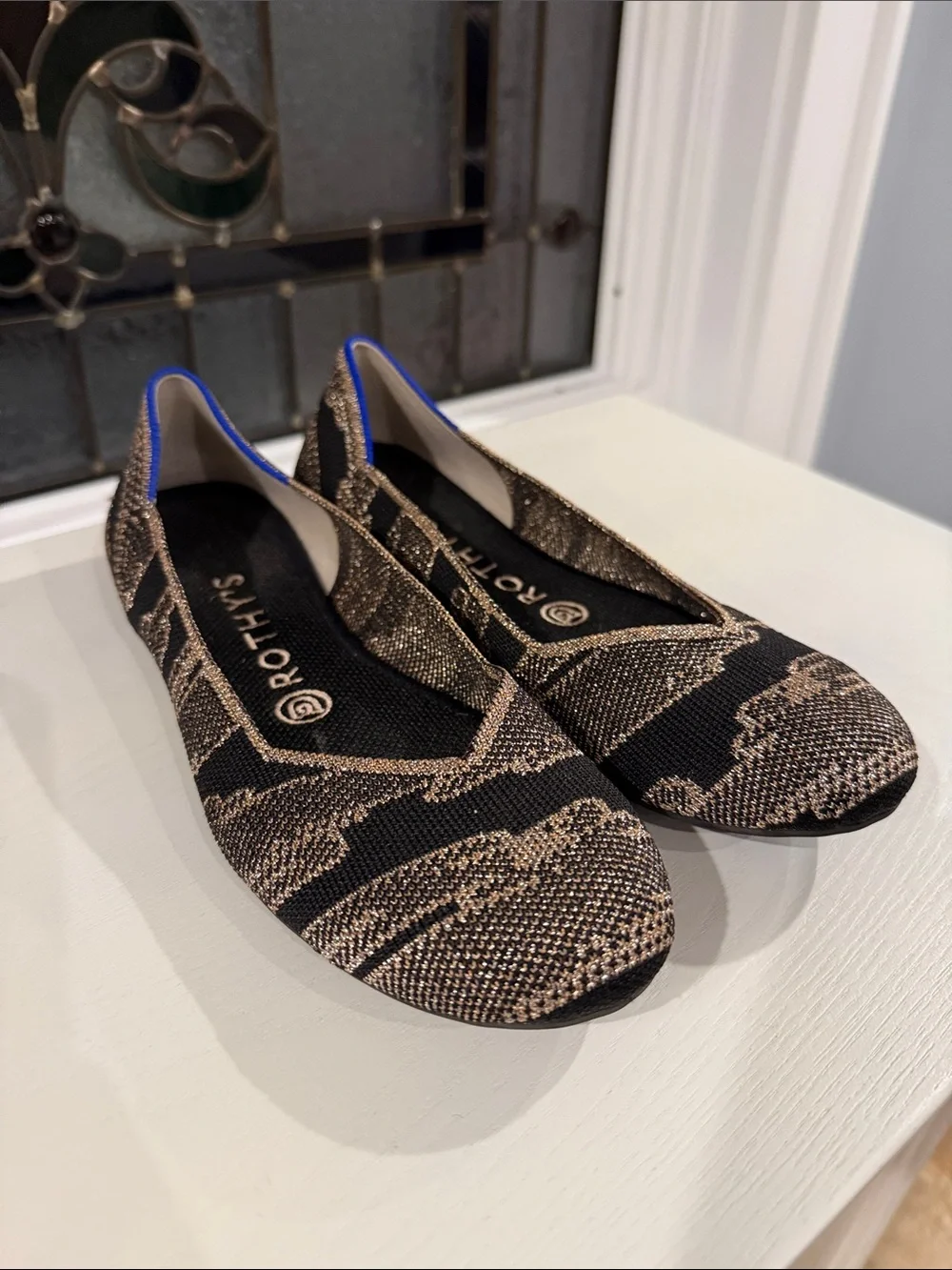 Rothy's Black and Gold Round Toe Knit Ballet Flats